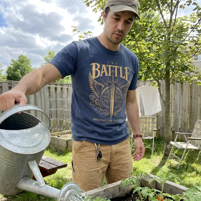 The Battle Belongs To The Lord worn by a model | Navy model front