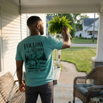 Follow The Word Cow worn by a model | Sea Foam model back