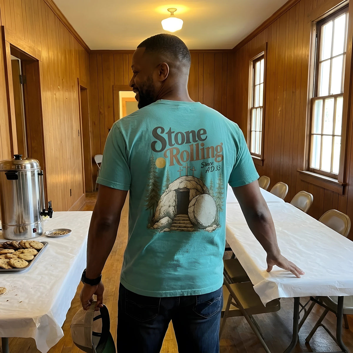 Stone Rolling Since AD 33 worn by a model | Sea Foam model back